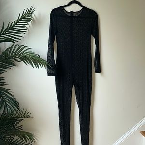 Black printed mesh jumpsuit